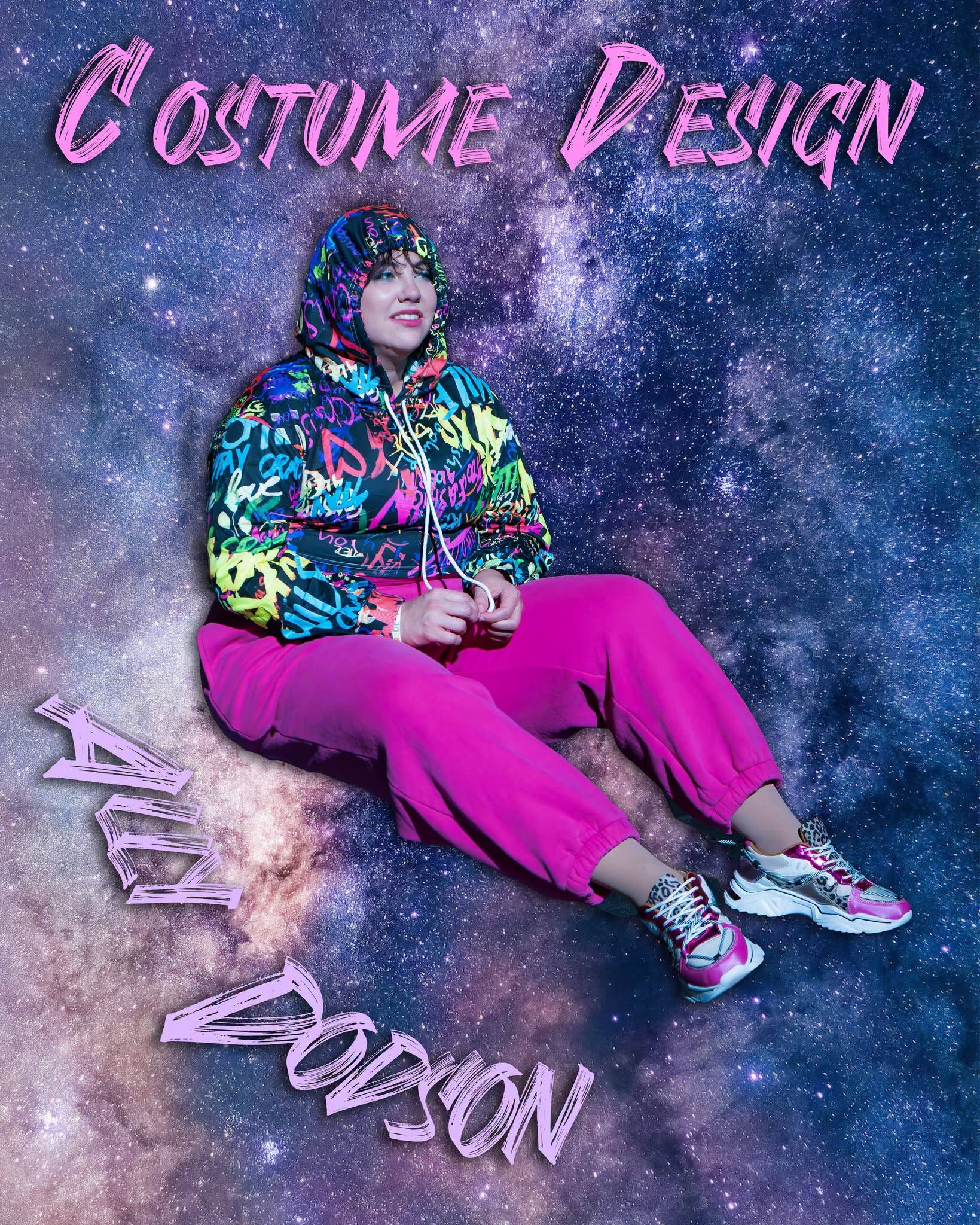 Dance Nation’s costume designer poses in a colorful outfit against a galaxy backdrop.
