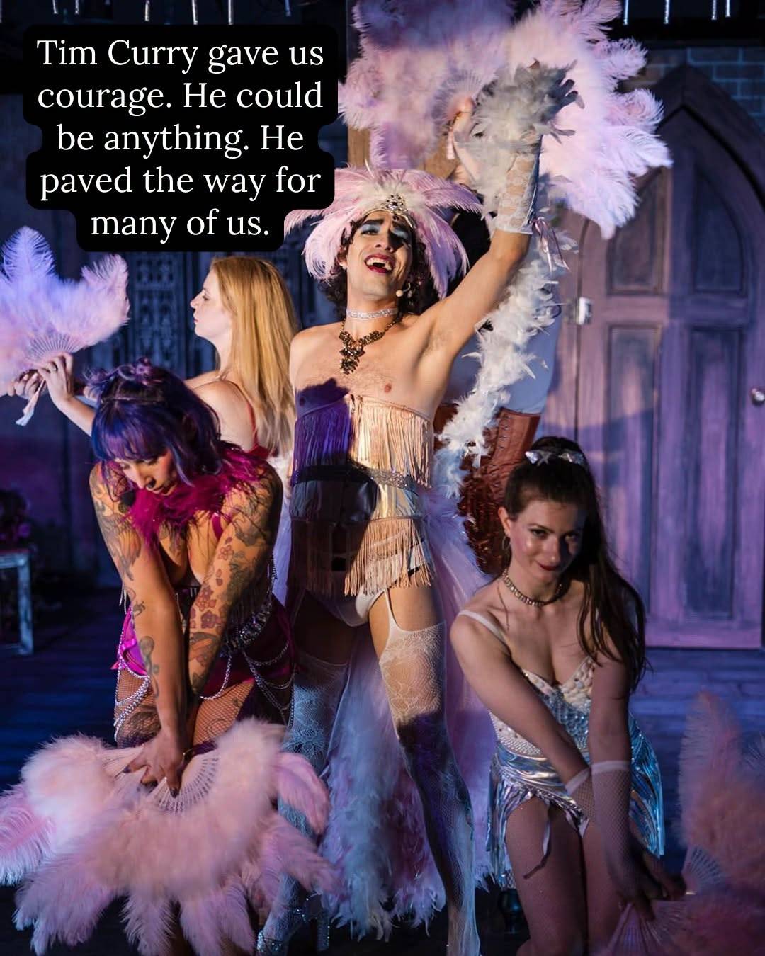 Cast members in feathers and sequins mid-number, with the words “Tim Curry gave us courage. He could be anything. He paved the way for many of us.”